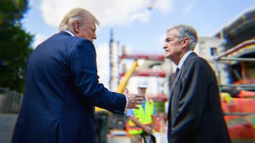 Donald Trump speaks to Fed Chair Jerome Powell during a tour of the Federal Reserve.